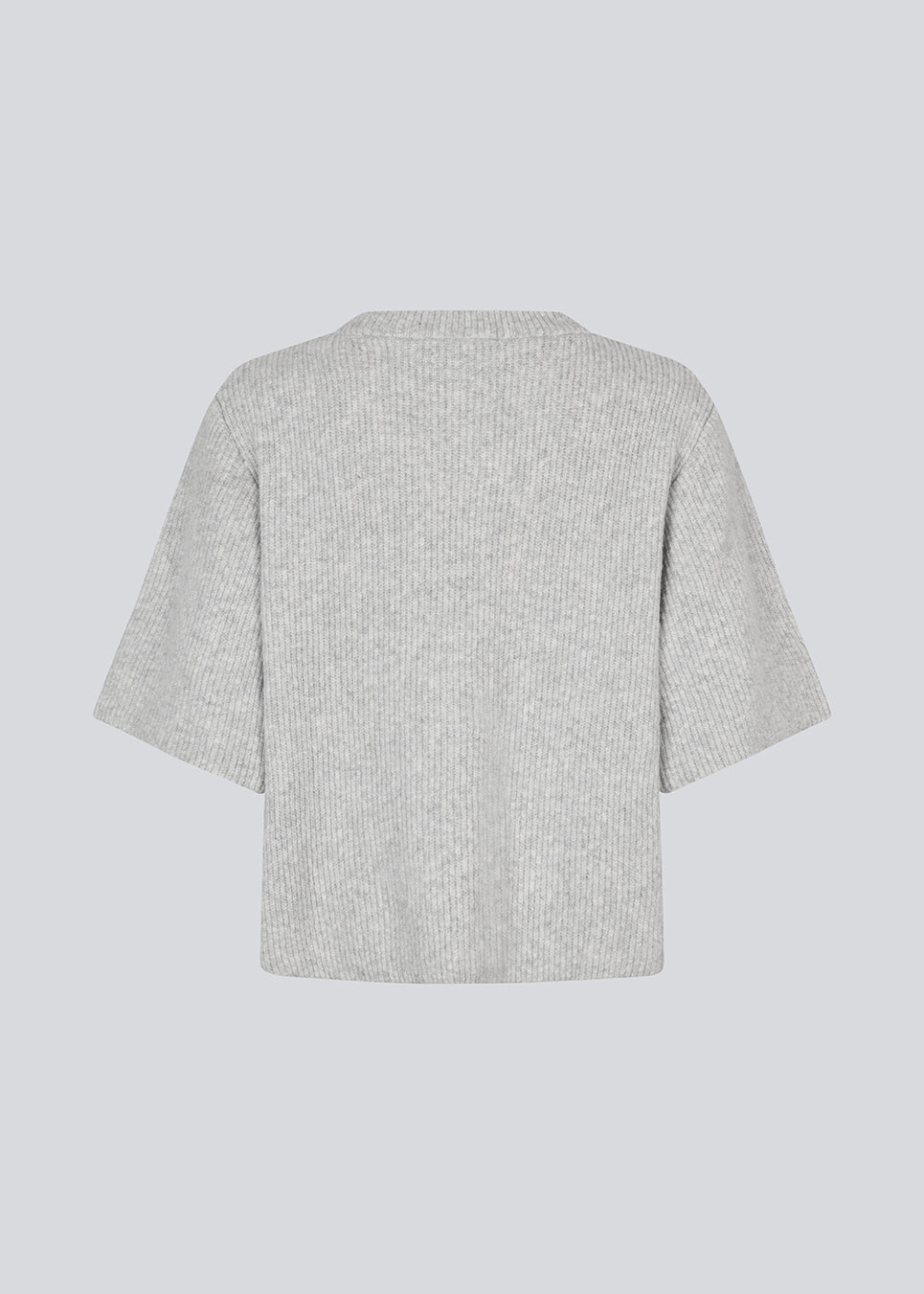 Shortsleeved cardigan in soft knit. NoeMD cardigan has a loose fit and button closure at the front.