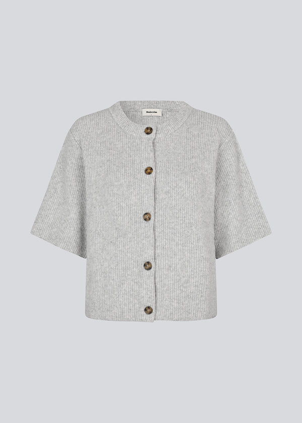 Shortsleeved cardigan in soft knit. NoeMD cardigan has a loose fit and button closure at the front.