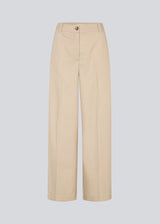 NormaMD pants in beige have a medium-high waist, zipper, side pockets, and paspoil pocket in the back.