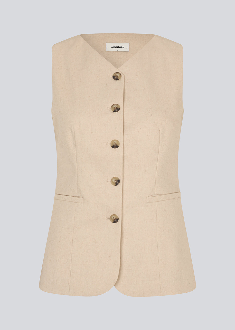 Fitted vest with a v-neck. NormaMD top has a button closure and two pockets in front.