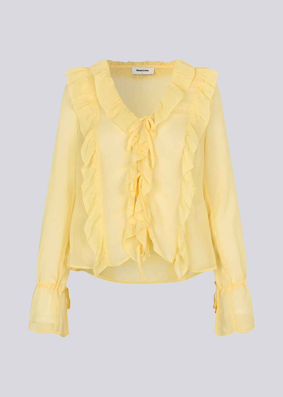 Long-sleeved top with a loose fit and frill details. NorrisMD top has a v-neck and wide sleeves with tie bands.