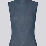 Sleeveless top in a structured material with a high neck. OasisMD top has wavy hems at neckline, arm hole and hem.