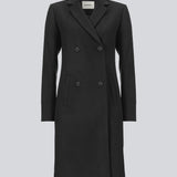 Beautiful, knee-length wool coat in black. Odelia coat is closed at front by 4 buttons and is fitted around the waist, which gives a feminine look. Because of the high content of wool the jacket will be perfect for fall and the mild winters.