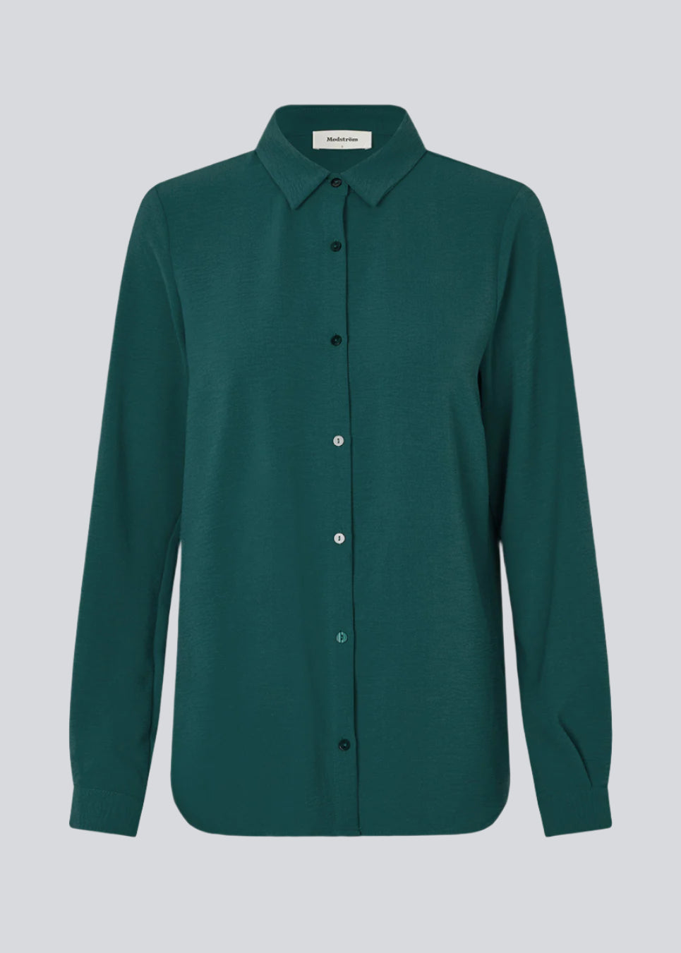 Classic shirt in a loose and relaxed silhouette. Ossa shirt has a small collar, slim cuff and buttons in a matching colour for a sleek design.