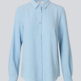Classic shirt in light baby blue in a loose and relaxed silhouette. Ossa shirt has a small collar, slim cuff and buttons in a matching colour for a sleek design.&nbsp;