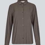 Our classic OssaMD shirt in brown has a loose and relaxed silhouette. Ossa shirt has a small collar, slim cuff and buttons in a matching colour for a sleek design.&nbsp;
