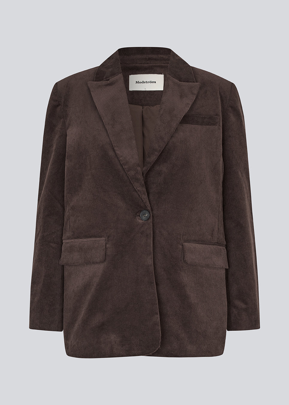 Blazer with a classic and elegant design in corduroy. Pablomd blazer has a button closure and two front pockets. The model is 175 cm and wears a size s/36.