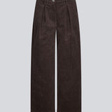Suit trousers with pleats in corduroy. Pablomd wide pants has long wide legs with side pockets.