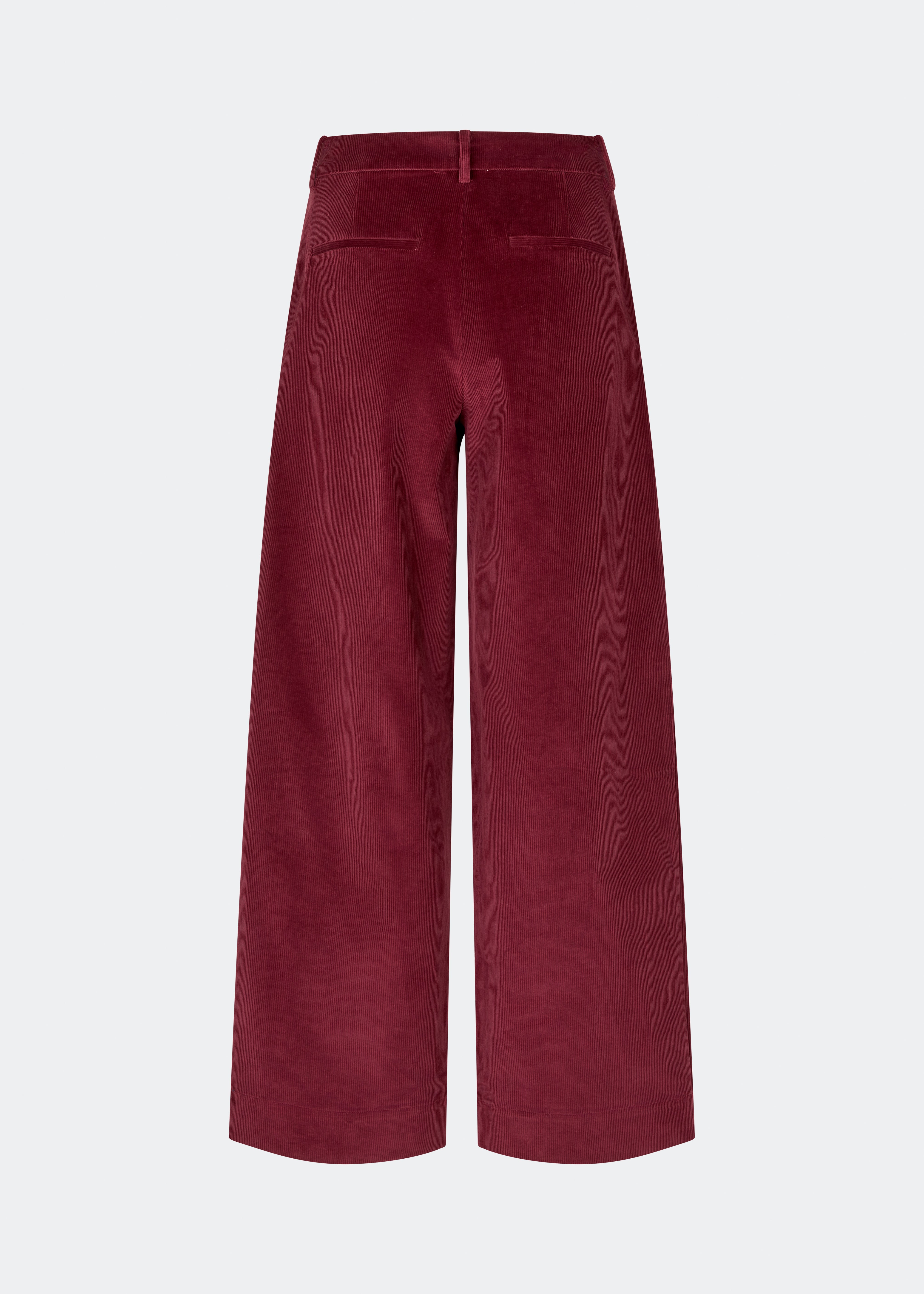 Suit trousers with pleats in corduroy. Pablomd wide pants has long wide legs with side pockets. 