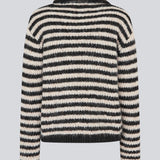 Soft knit in recycled polyester. Packermd rollneck has long sleeves and a high neckline with a side slit. The model is 175 cm and wears a size s/36.
