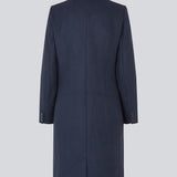 Beautiful, long wool coat in navy. Pamela coat is closed by 3 big buttons at front and is waisted, which gives a feminine look. Because of the high content of wool you will be able to keep warm all through fall and the mild winters.