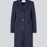 Beautiful, long wool coat in navy. Pamela coat is closed by 3 big buttons at front and is waisted, which gives a feminine look. Because of the high content of wool you will be able to keep warm all through fall and the mild winters.