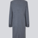 Beautiful, long wool coat. Pamela coat is closed by 3 big buttons at front and is waisted, which gives a feminine look. Because of the high content of wool you will be able to keep warm all through fall and the mild winters. The model is 176 cm and wears a size S/36