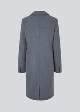 Beautiful, long wool coat. Pamela coat is closed by 3 big buttons at front and is waisted, which gives a feminine look. Because of the high content of wool you will be able to keep warm all through fall and the mild winters. The model is 176 cm and wears a size S/36