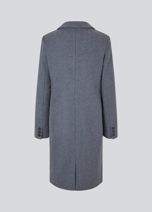 Beautiful, long wool coat. Pamela coat is closed by 3 big buttons at front and is waisted, which gives a feminine look. Because of the high content of wool you will be able to keep warm all through fall and the mild winters. The model is 176 cm and wears a size S/36