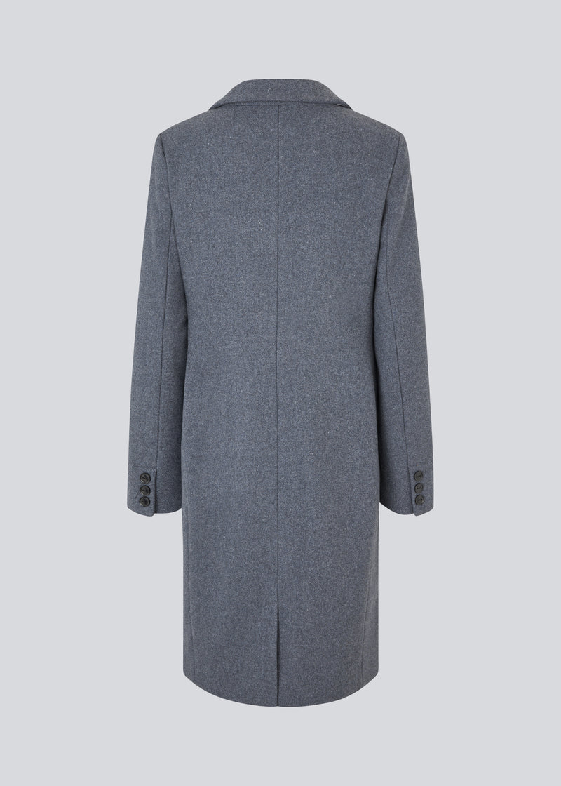 Beautiful, long wool coat. Pamela coat is closed by 3 big buttons at front and is waisted, which gives a feminine look. Because of the high content of wool you will be able to keep warm all through fall and the mild winters. The model is 176 cm and wears a size S/36