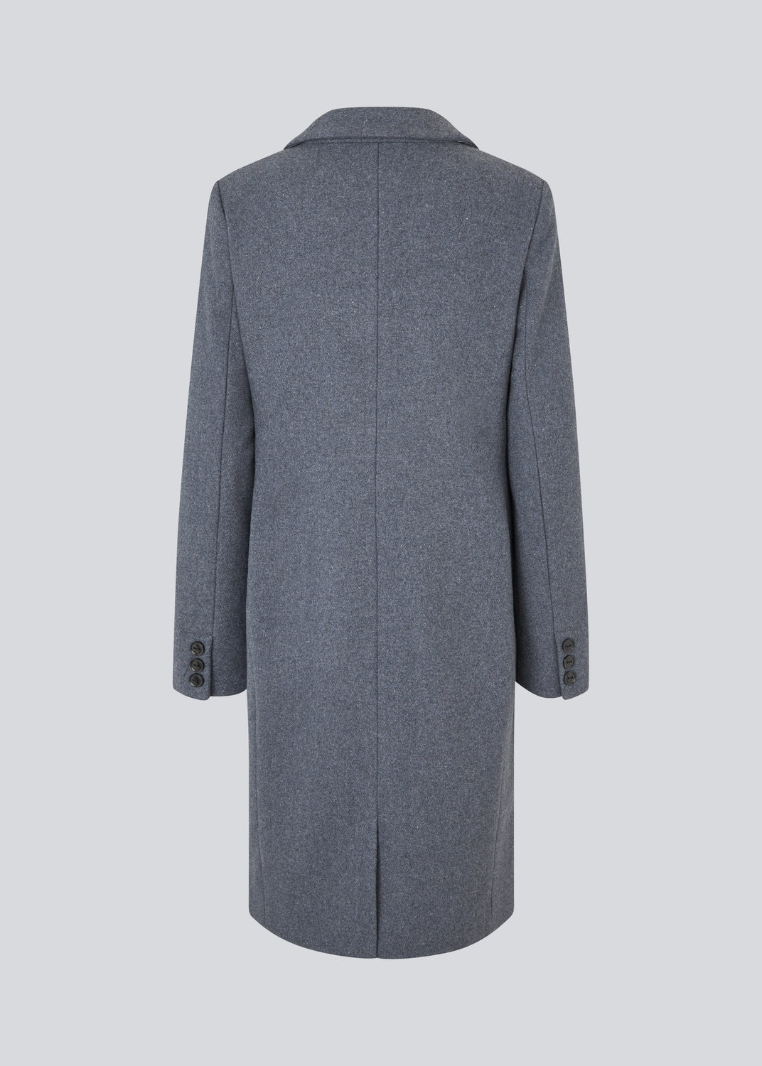 Beautiful, long wool coat. Pamela coat is closed by 3 big buttons at front and is waisted, which gives a feminine look. Because of the high content of wool you will be able to keep warm all through fall and the mild winters. The model is 176 cm and wears a size S/36