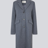 Beautiful, long wool coat. Pamela coat is closed by 3 big buttons at front and is waisted, which gives a feminine look. Because of the high content of wool you will be able to keep warm all through fall and the mild winters. The model is 176 cm and wears a size S/36
