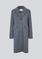 Beautiful, long wool coat. Pamela coat is closed by 3 big buttons at front and is waisted, which gives a feminine look. Because of the high content of wool you will be able to keep warm all through fall and the mild winters. The model is 176 cm and wears a size S/36