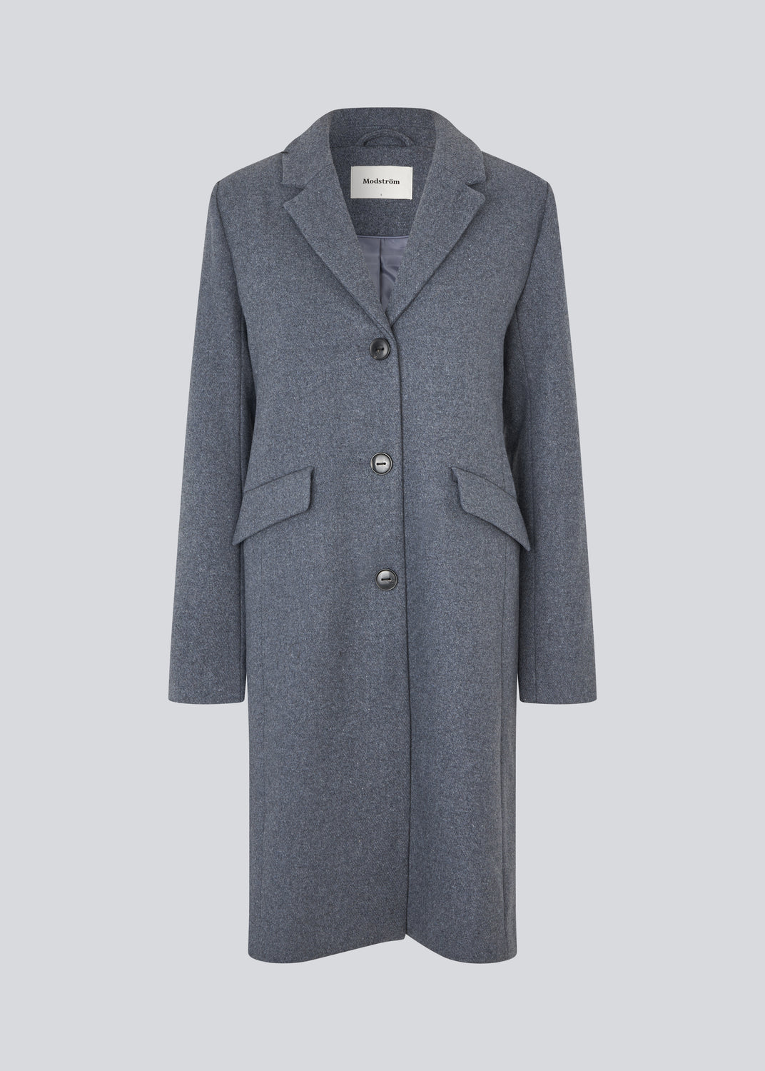 Beautiful, long wool coat. Pamela coat is closed by 3 big buttons at front and is waisted, which gives a feminine look. Because of the high content of wool you will be able to keep warm all through fall and the mild winters. The model is 176 cm and wears a size S/36