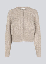 Knitted cable knit cardigan with pearl buttons. Pammiemd cardigan has a round neckline and ribbed hem.