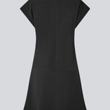 Short-sleeved dress with ruffled details. Pandymd dress has a loose fit with volume in the skirt.