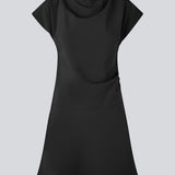 Short-sleeved dress with ruffled details. Pandymd dress has a loose fit with volume in the skirt.