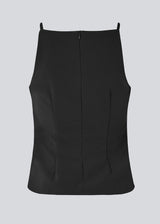 Fitted top with thin straps. Pandymd strap top has a ruffle detail at the side and an invisible back zipper.