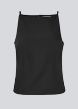 Fitted top with thin straps. Pandymd strap top has a ruffle detail at the side and an invisible back zipper.
