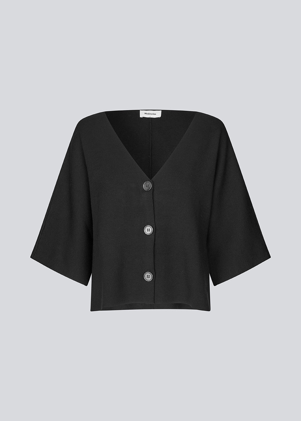 Knitted cardigan with short sleeves in EcoVero viscose. Paris SS cardigan has a v-neck and button closure in front.&nbsp;