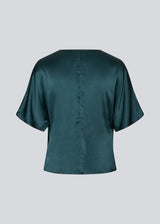 Dark green satin top with a waterfall detail. Parveenmd top is fitted and has short sleeves.&nbsp;
