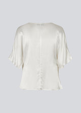 White satin top with a waterfall detail. Parveenmd top is fitted and has short sleeves.&nbsp;