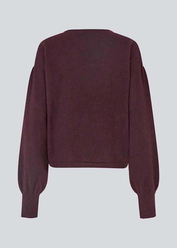 Burgundy/dark red soft knit with loose sleeves. Patrickmd O-neck has a round neckline and ribbed hem.&nbsp;