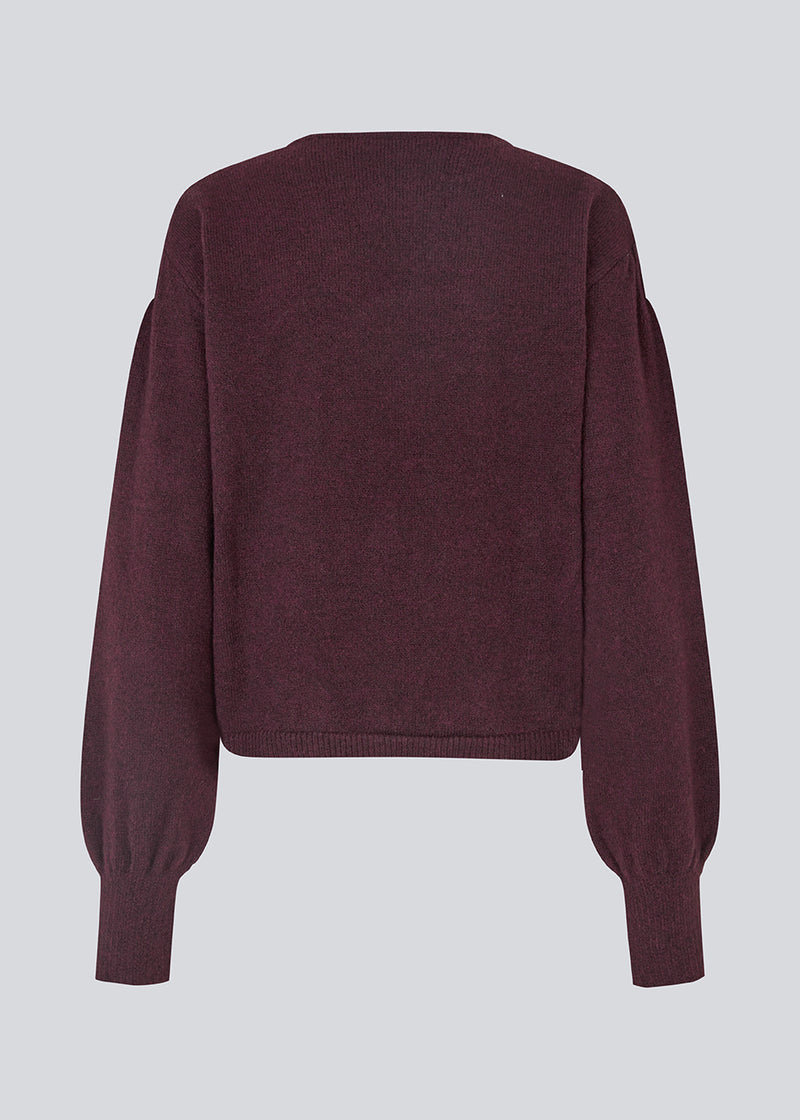 Burgundy/dark red soft knit with loose sleeves. Patrickmd O-neck has a round neckline and ribbed hem.&nbsp;