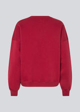 Sweatshirt in dark red with logo made in a cotton mixture. Paulamd sweat has a round neckline and ribbing at the sleeves and bottom. The model is 175 cm and wears a size s/36.