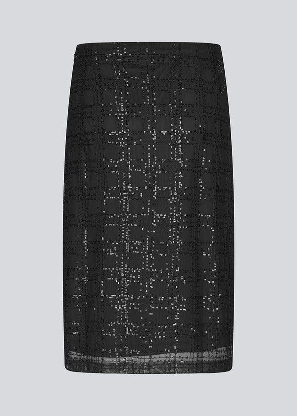 Black midi skirt in a transparent material with sequins. Pearleenmd skirt has lining and an invisible side zipper.&nbsp;