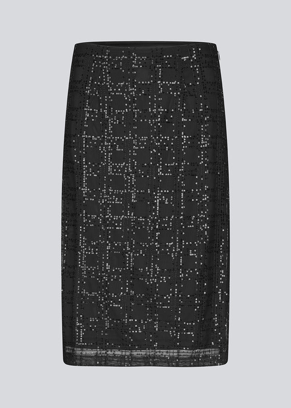 Black midi skirt in a transparent material with sequins. Pearleenmd skirt has lining and an invisible side zipper.&nbsp;