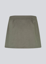 Skirt with an asymmetric look. Pedromd skirt is short and has a front button closure.&nbsp;