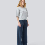 Soft knit with short puff sleeves. Petronellamd SS o-neck has a round neckline and ribbed trim. The model is 175 cm and wears a size S/36.