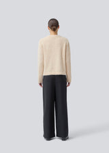 Soft knit in recycled polyester. Philipmd stripe O-neck has long sleeves and a round neckline. The model is 175 cm and wears a size s/36.
