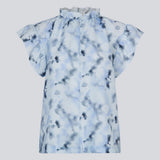 Sleeveless top with ruffled details. Phillipsmd print top has a v-neck with a button closure and ruffles at the neck and sleeves.