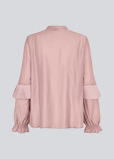 Shirt in the color "Fragrant Lilac" with ruffle details and a front opening. Phungmd shirt has a loose fit and flowy sleeves.