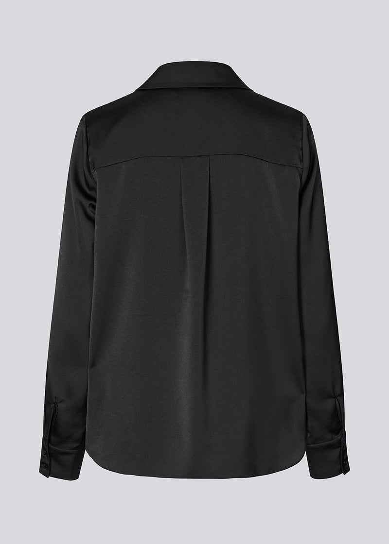 Black classic shirt with button closure in front in satin. Pietromd shirt has a loose fit and a shirt collar.