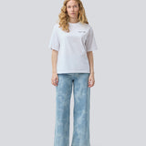 Loose T-shirt with print in 100% cotton. Pipemd t-shirt has an oversized fit and a round neckline. The model is 175 cm and wears a size s/36.