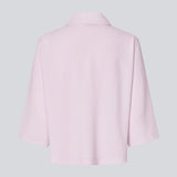 Shirt with 3/4 sleeves in 100% recycled polyester. Popelmd shirt has a loose fit and button closure in front.