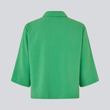 Shirt with 3/4 sleeves in 100% recycled polyester.  Popelmd shirt has a loose fit and button closure in front. The model is 175 cm and wears a size s/36.