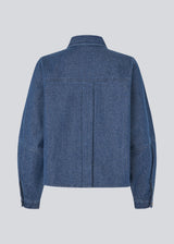 Loose cotton denim shirt. Possymd shirt has a shirt collar, button closure, and a chest pocket.&nbsp;