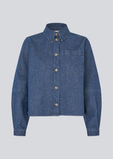 Loose cotton denim shirt. Possymd shirt has a shirt collar, button closure, and a chest pocket.&nbsp;