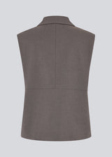 Grey loose vest with a hidden front button closure. Primrosemd vest has a shirt collar and two front pockets.&nbsp;
