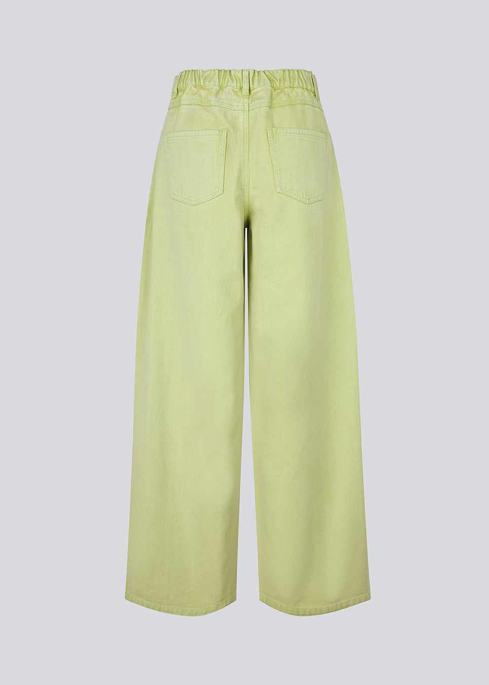 Wide-leg jeans in green cotton denim. Princessmd pants have a high waist with elastic and front and back pockets. The model is 175 cm and wears a size S/36.

